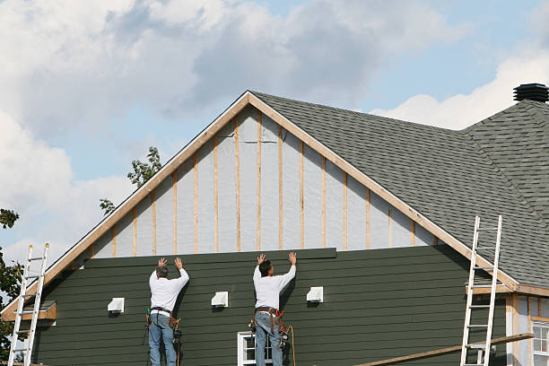Professional Siding Contractor technician working in Sayville, NY
